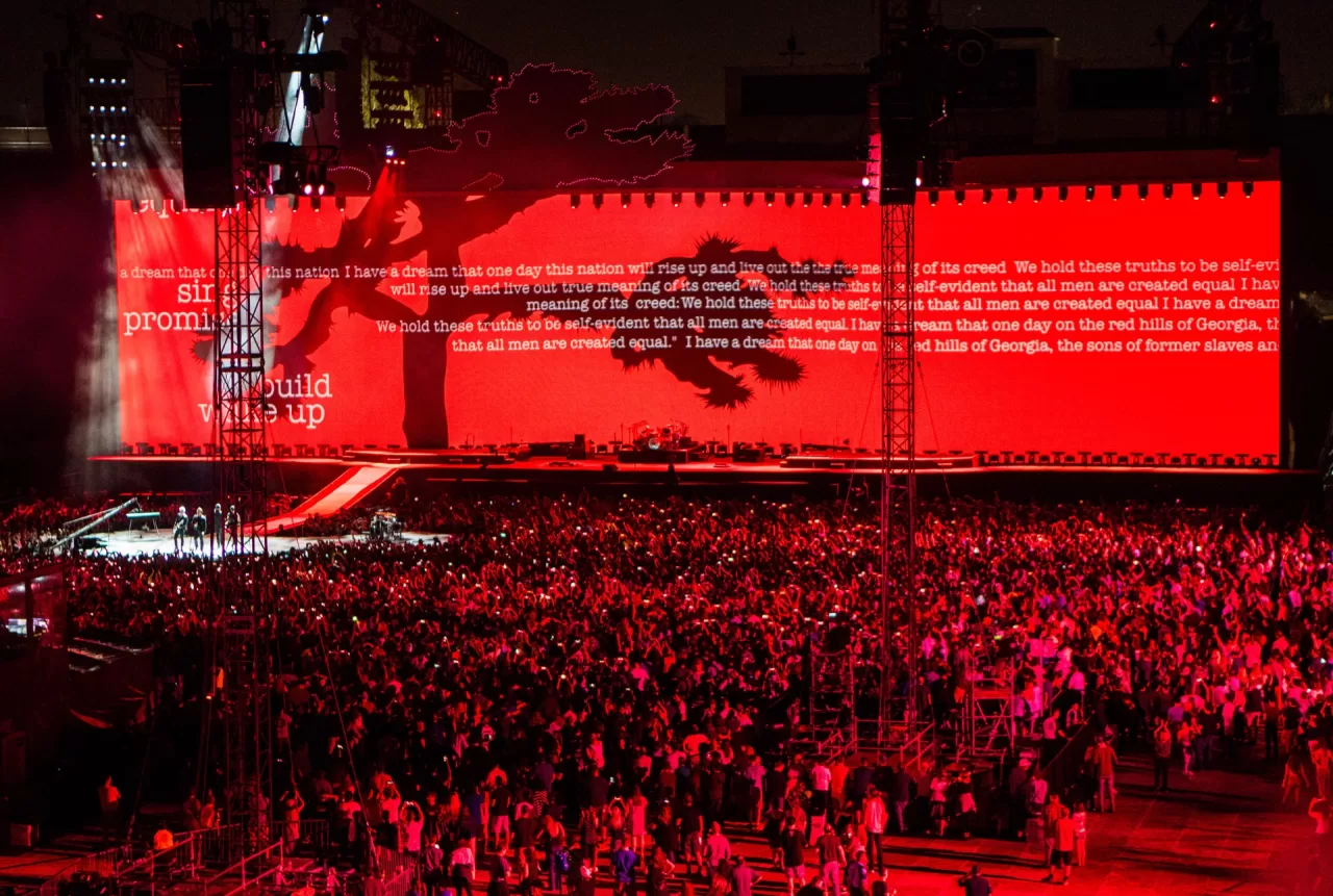 U2’s red-lit Joshua Tree stage and the crowd at the Rose Bowl in 2017