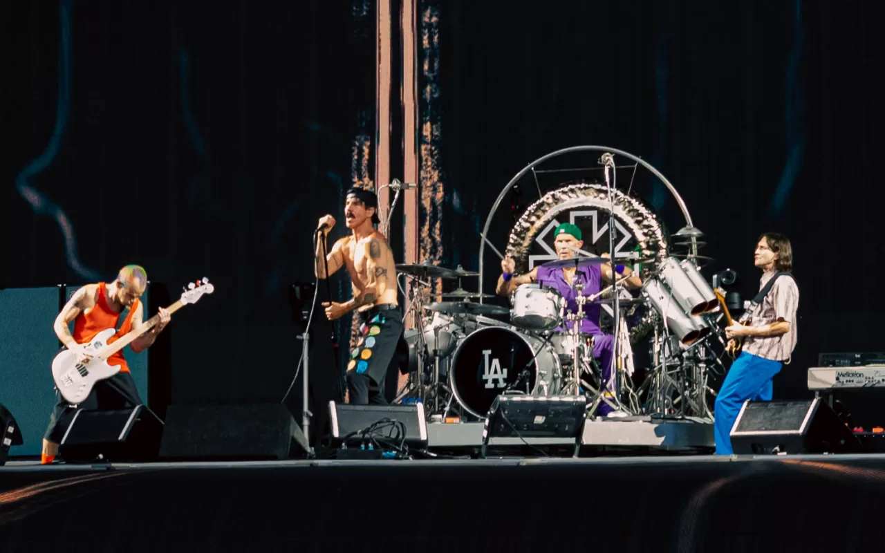 Red Hot Chili Peppers performing together onstage in London in June 2022